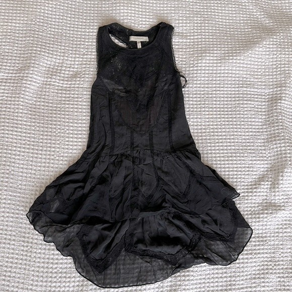 BCBGMAXAZRIA RUNWAY “SAFINA” Black T-Back tank top with high low peplum - Picture 1 of 10